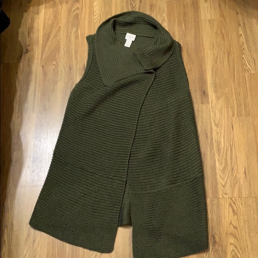 Sleeveless sweater intended to go over a top